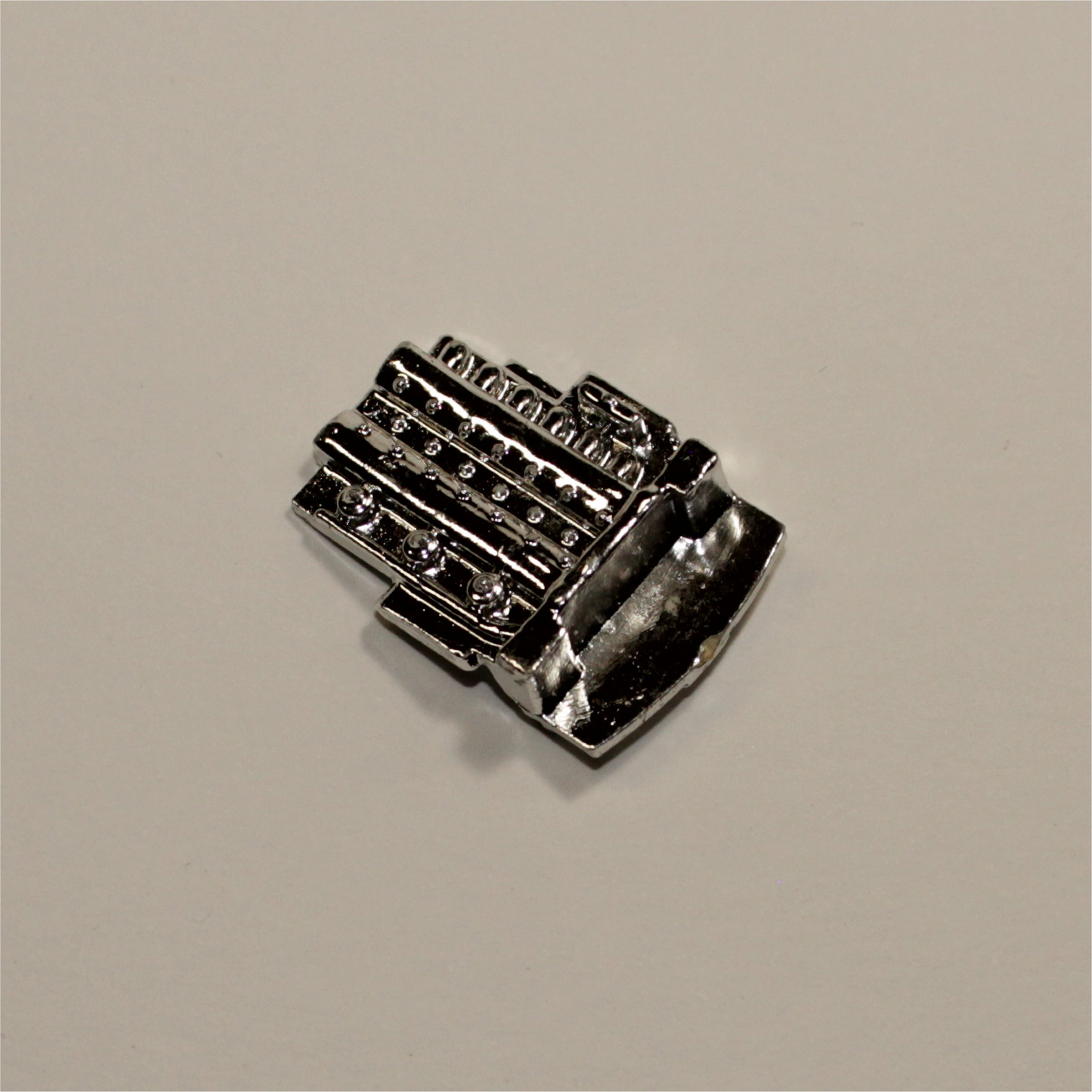 Dinky Toys 110b Aston Martin DB5 Plastic Plated Engine Unit