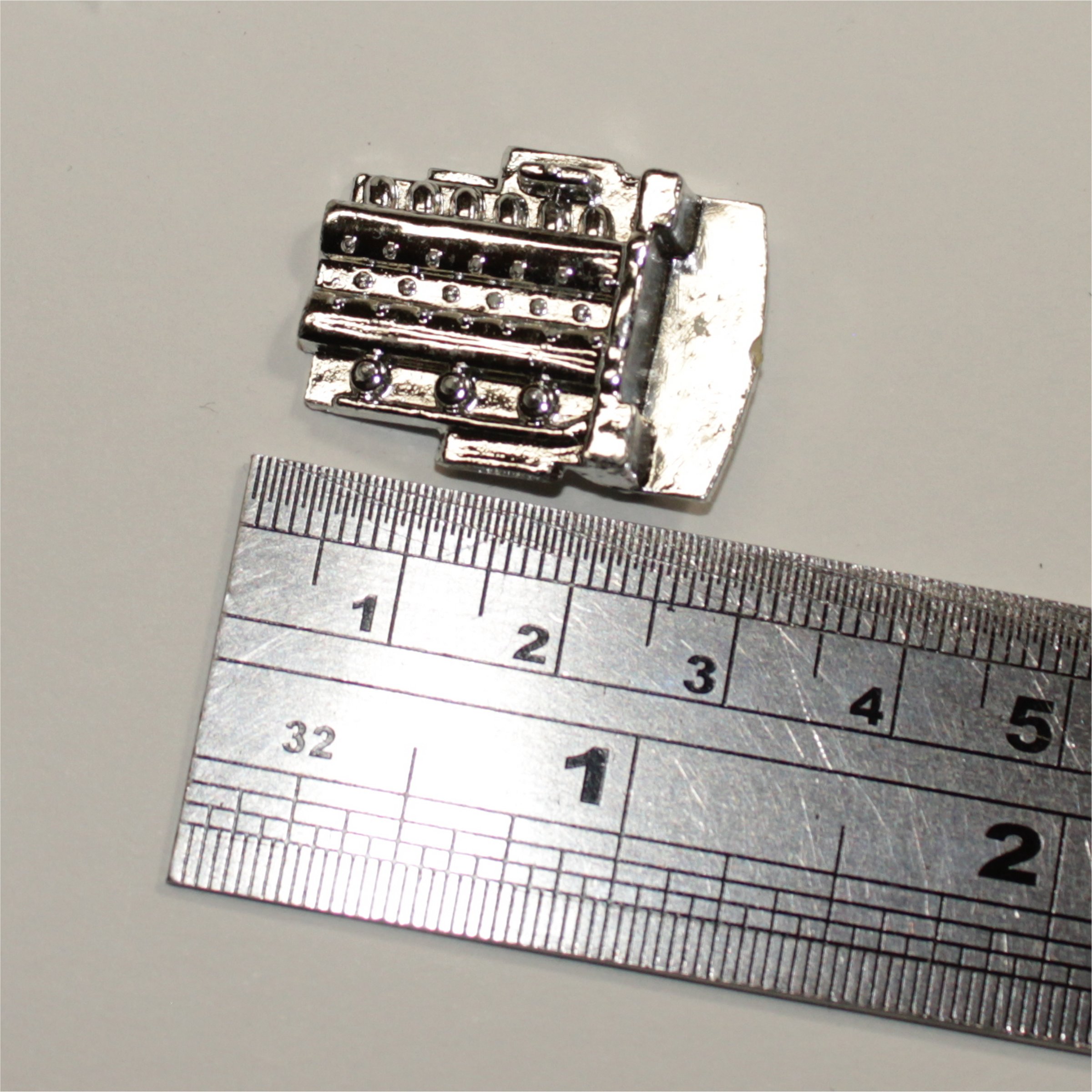 Dinky Toys 110b Aston Martin DB5 Plastic Plated Engine Unit